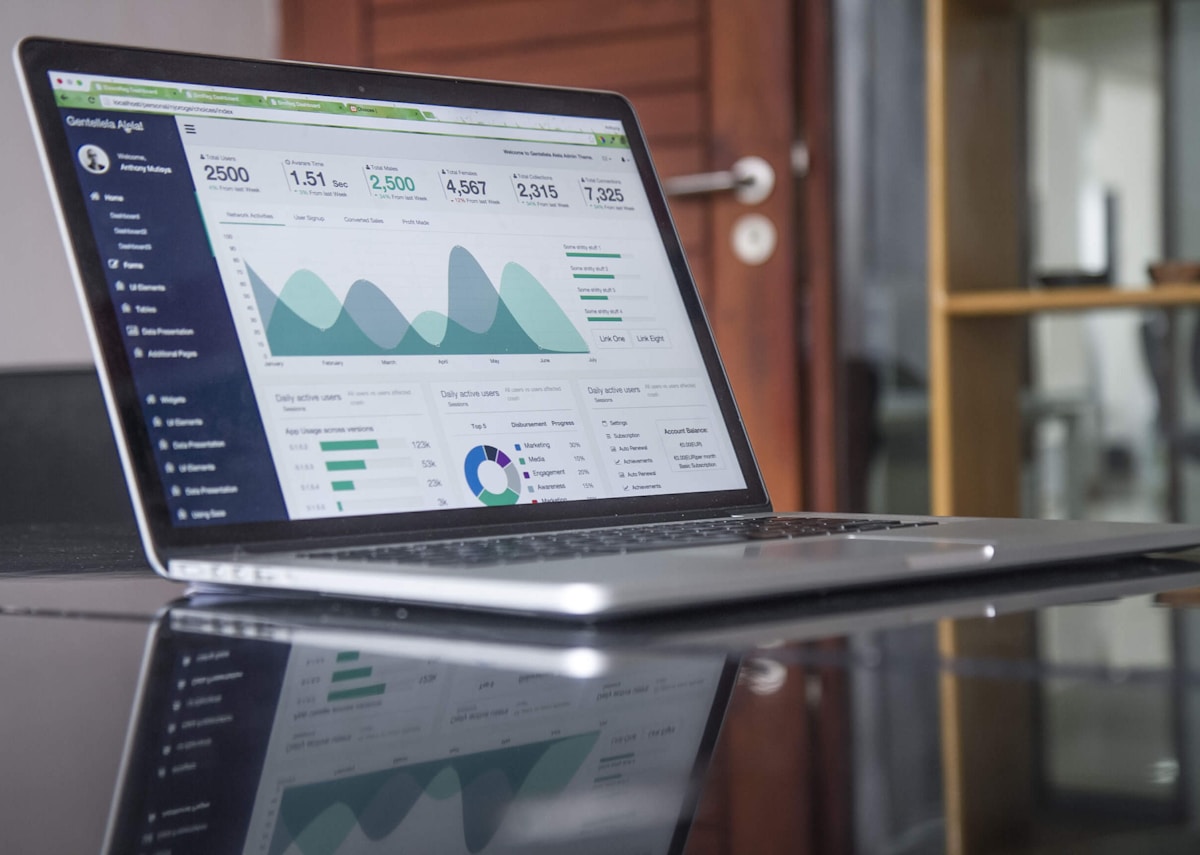 Laptop showing data analytics dashboard, representing CRM and lead tracking tools for property agents